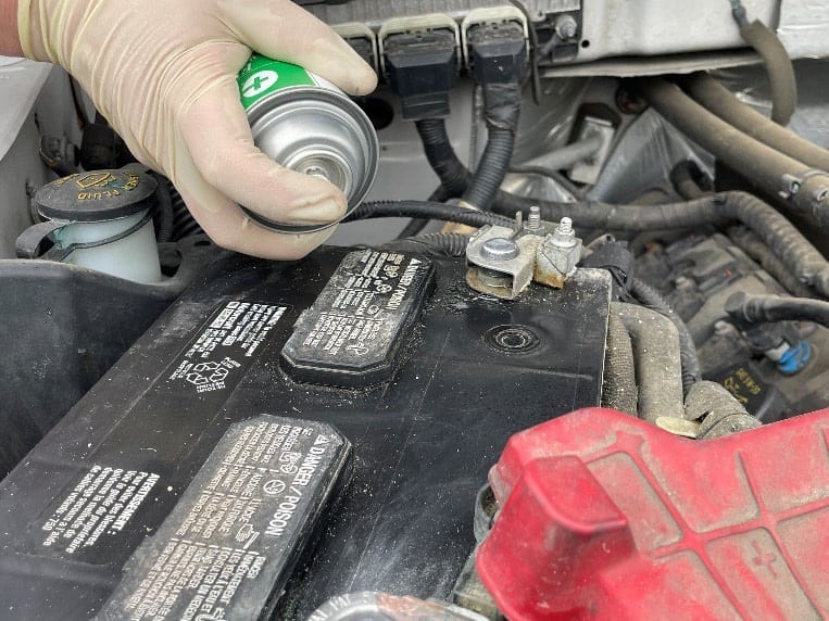 clean a corroded car battery