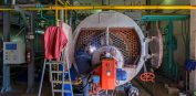 Worker Repairing The Boiler - Cortec Corporation